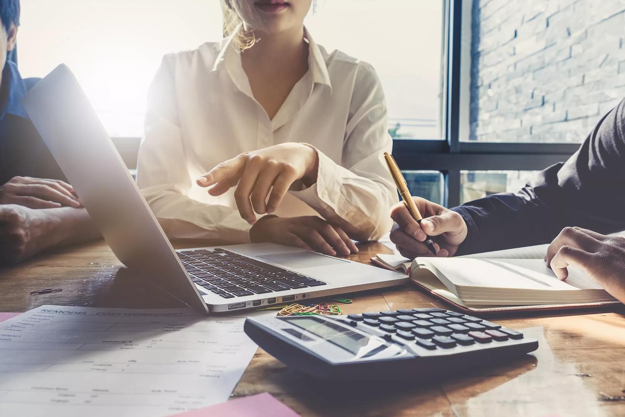 Business team hands at working with financial plan, meeting, discussion, brainstorm with tablet on office desk, Meeting concept.