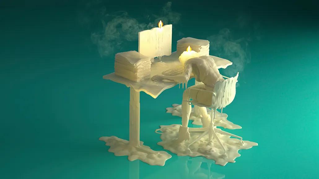 The melted wax body of a person in a desk chair slumps over a desk with their head—which is a burning candle—on the keyboard. The desk and its contents, also made of wax, are: a computer (with a lit flame on top), the keyboard, and two tall stacks of paper. Everything is melting and wax pools on the floor.