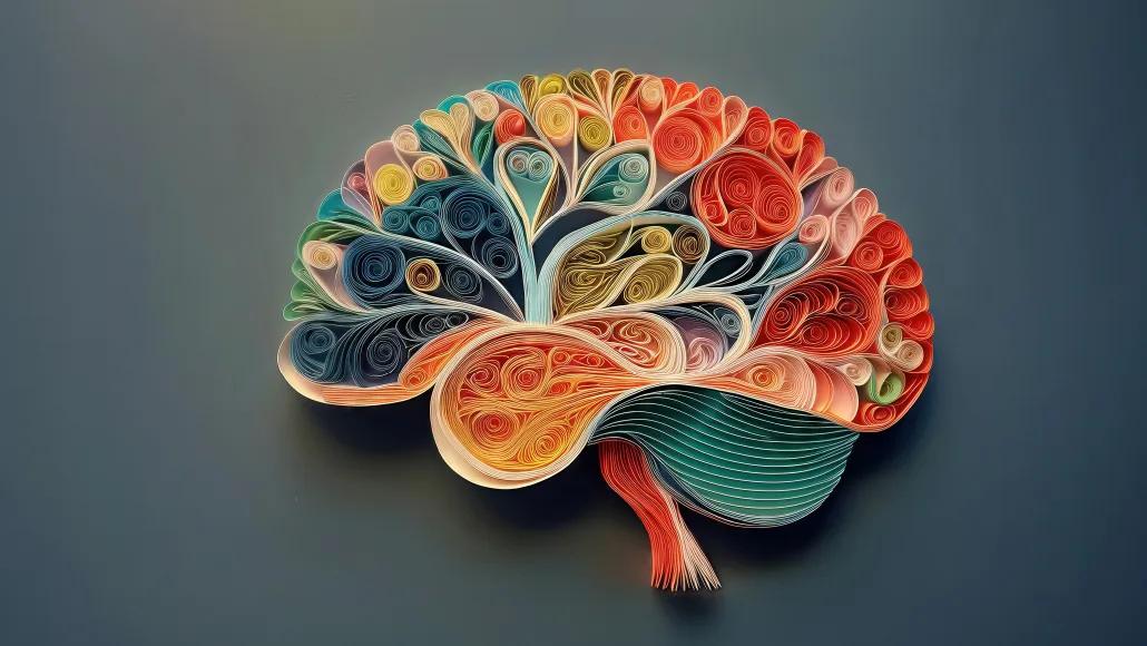 An illustration depicts paper folder into the shape of a brain.