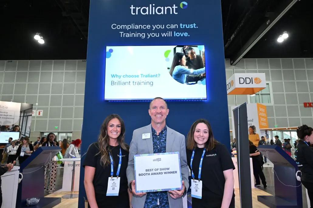 A photo shows the winners of the ATD26 Booth Awards standing in front of their EXPO booths.