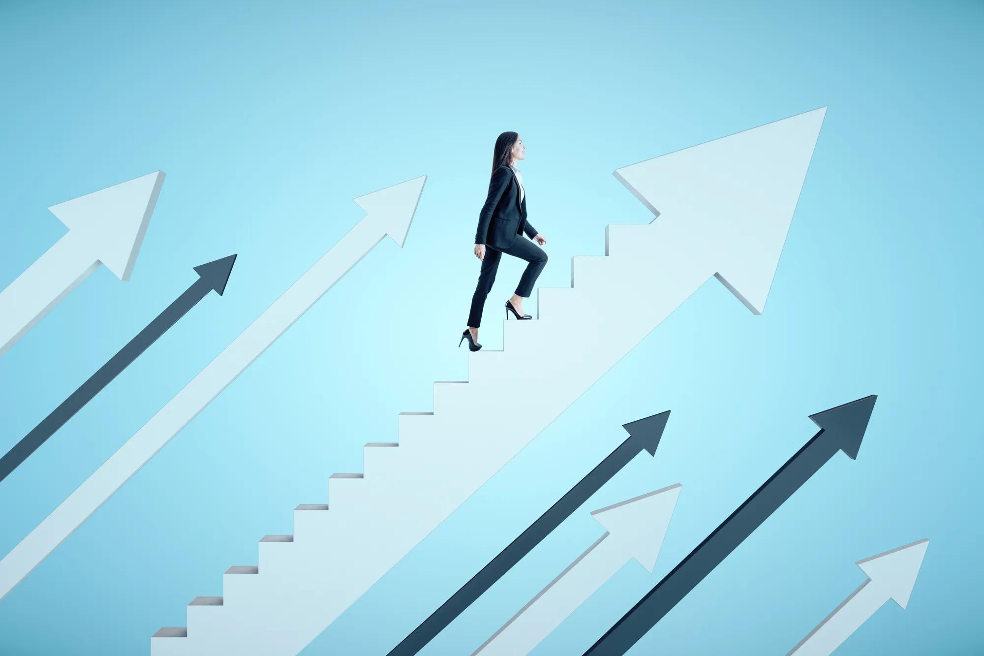 Eight upward trending arrows. The fourth arrow from the left is the largest and its top side is not straight like the others--it is a set of stairs. A woman ascends the stairs toward the top of the arrowhead.
