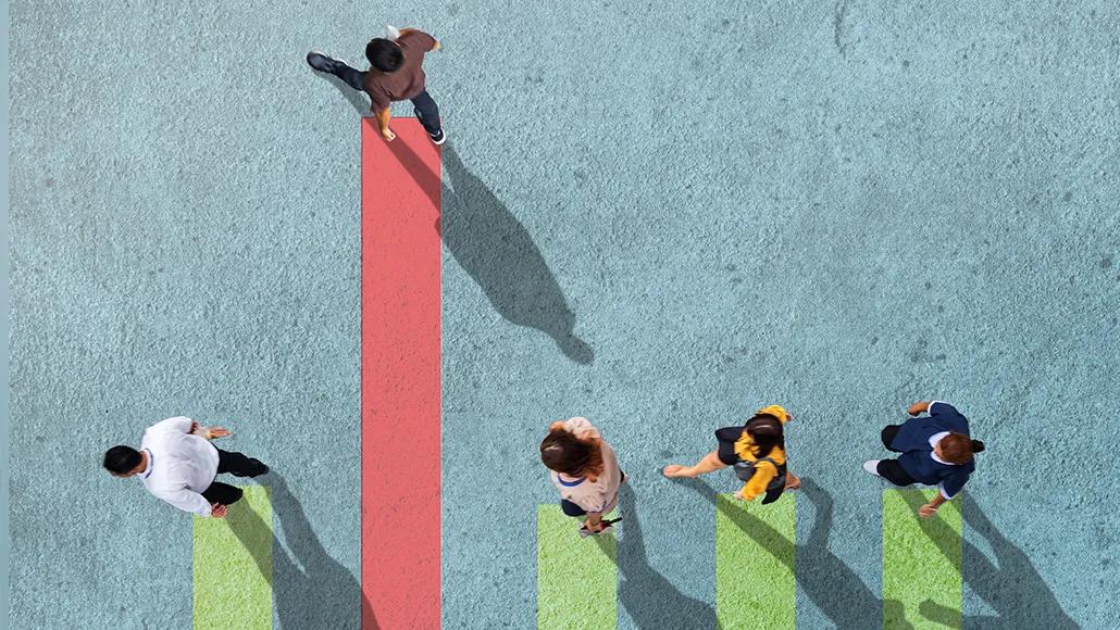 Five chalk lines on pavement. A person stands at the top of each line. Four of the people (the first, third, fourth, and fifth) face and walk toward the left. The second line is three times as long as the others and the person walks toward the top of the image.
