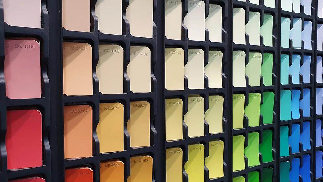 A wall of paint sample cards.