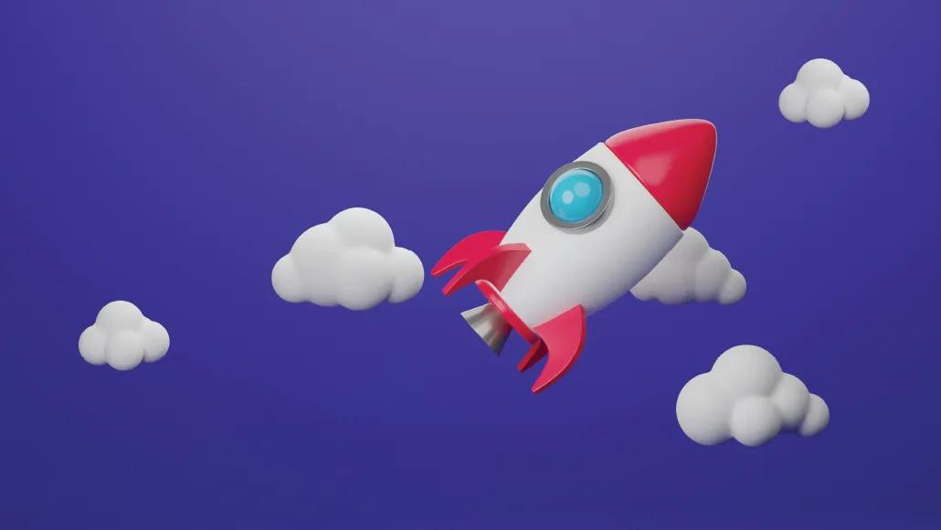 An illustration depicts a white and red rocket in a blue sky with clouds in the background