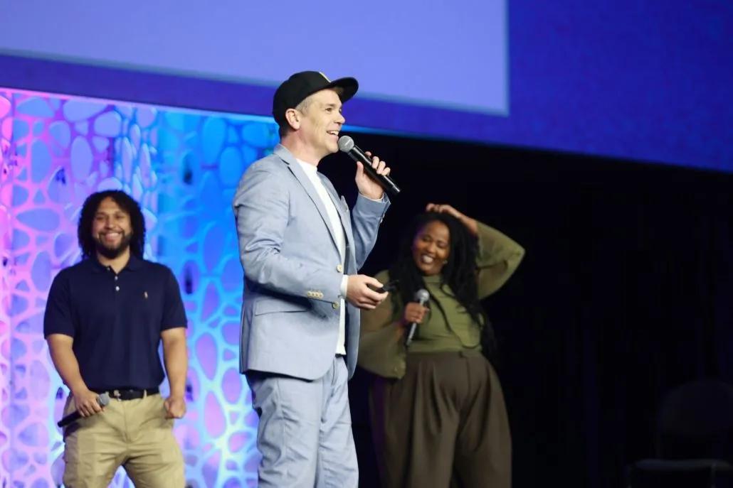 A photo shows freestyle+ onstage during their ATD26 keynote.