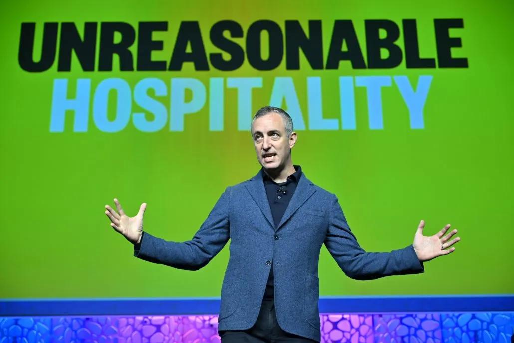 A photo shows keynote speaker Will Guidara on the ATD26 Mainstage.