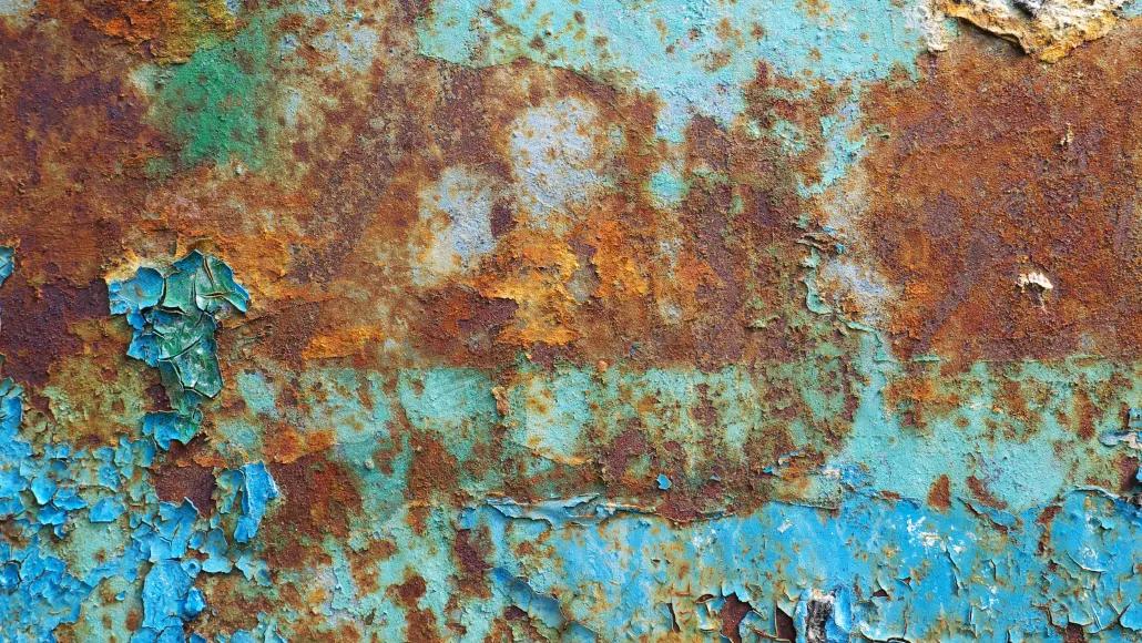 A photo shows rusted metal.